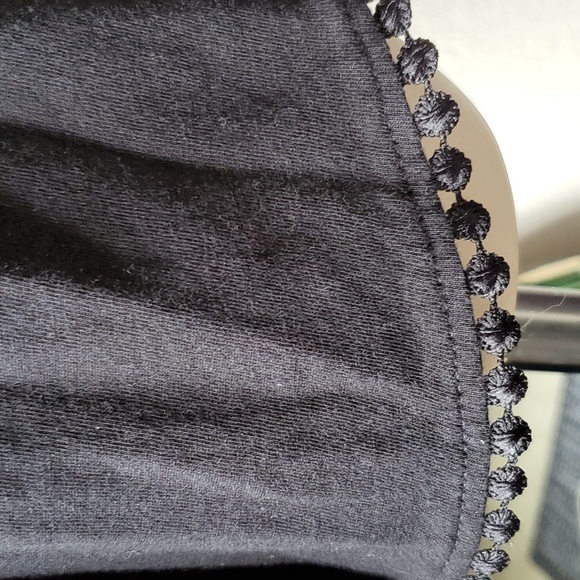 Like new, Romper black with ruffle and trim so cute split up the sides of short - Picture 4 of 7